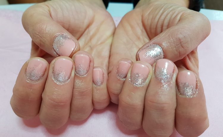 pink acrylic tips and silver nail art